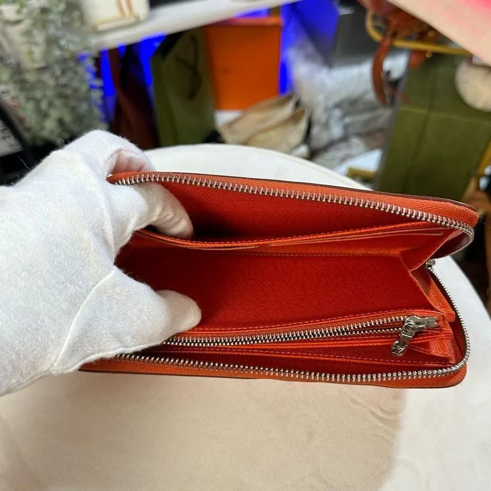 LOUIS VUITTON Long Wallet Epi Zippy Orange Women's Men's Leather